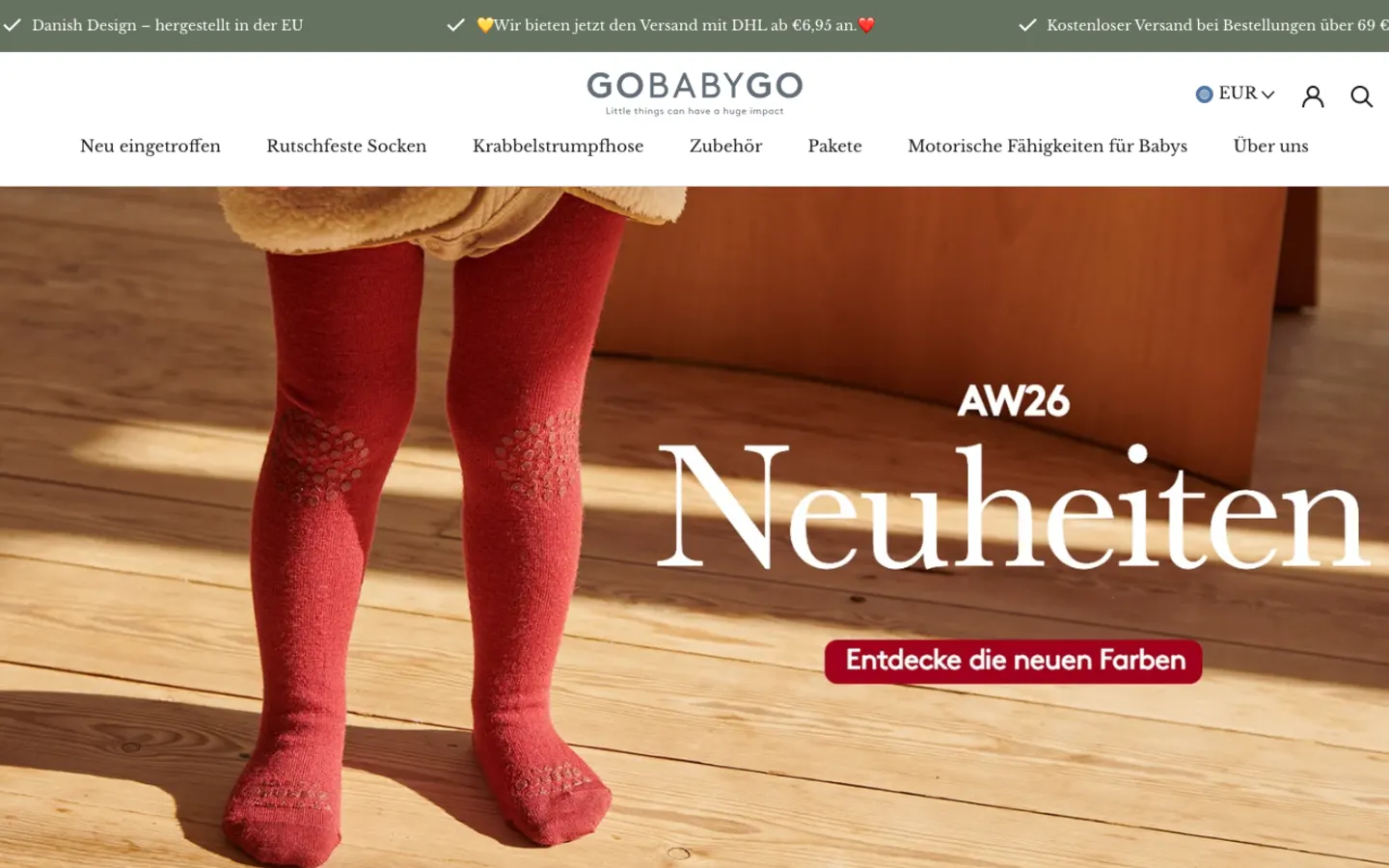 GoBabyGo store homepage with a toddler in red crawling tights and an AW26 new arrivals banner